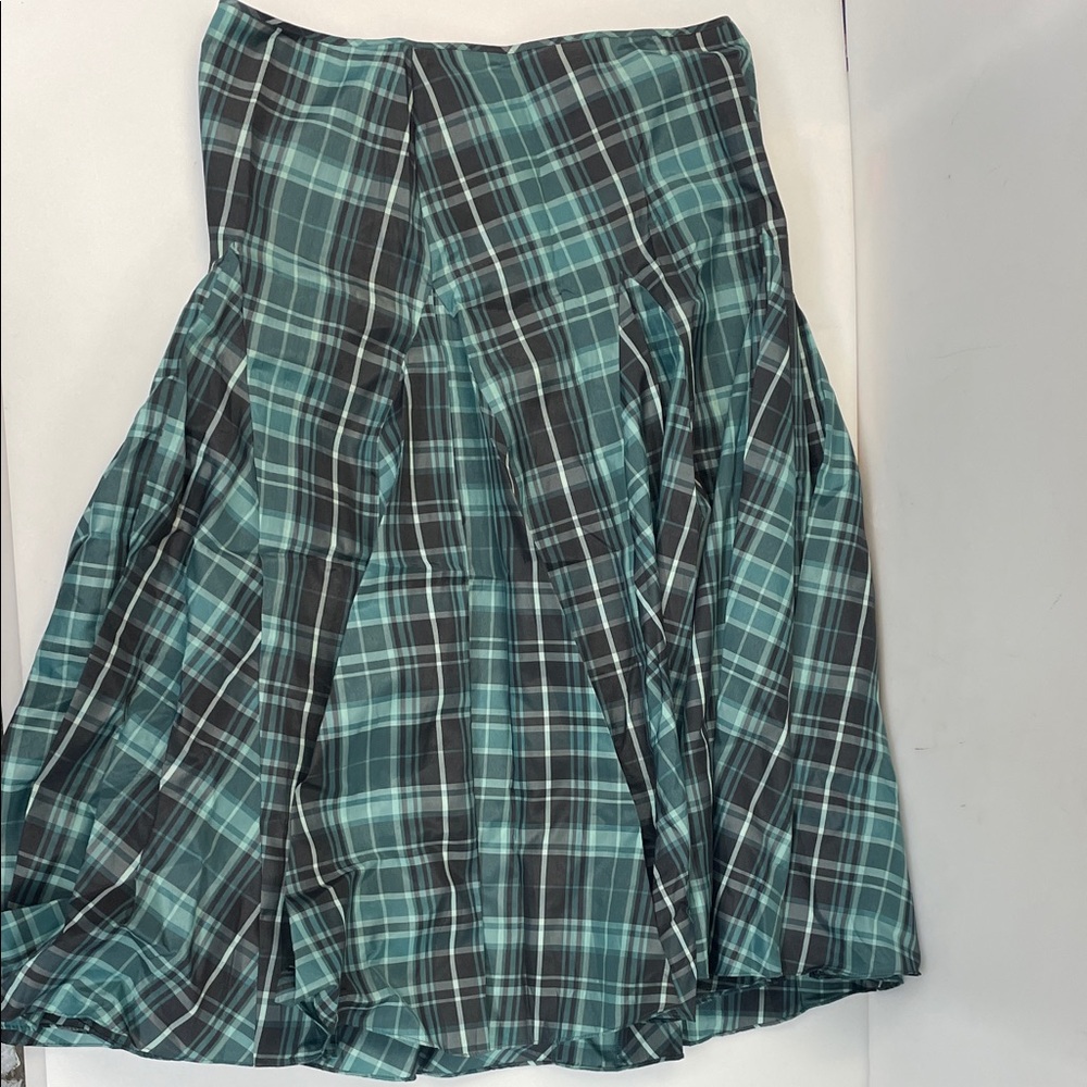 Measurements  Plaid Green Skirt
Marked 14 but use the sizes to fit